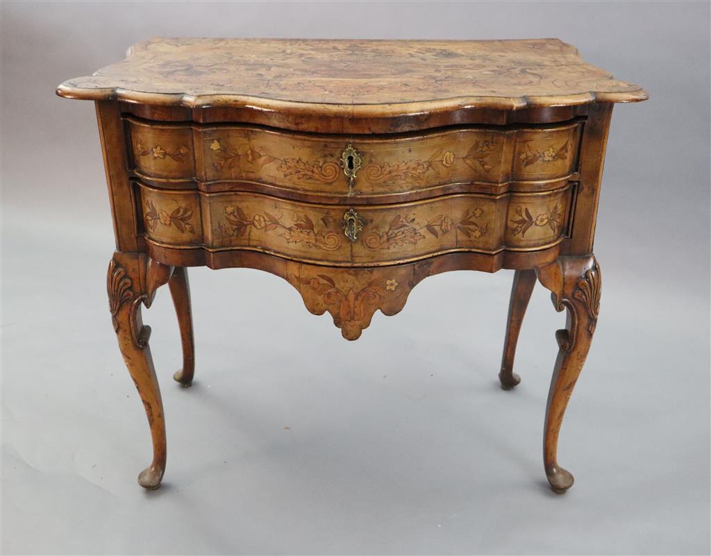 An 18th century Dutch and walnut marquetry lowboy, W.2ft 9in. D.1ft 8in. H.2ft 5in.
